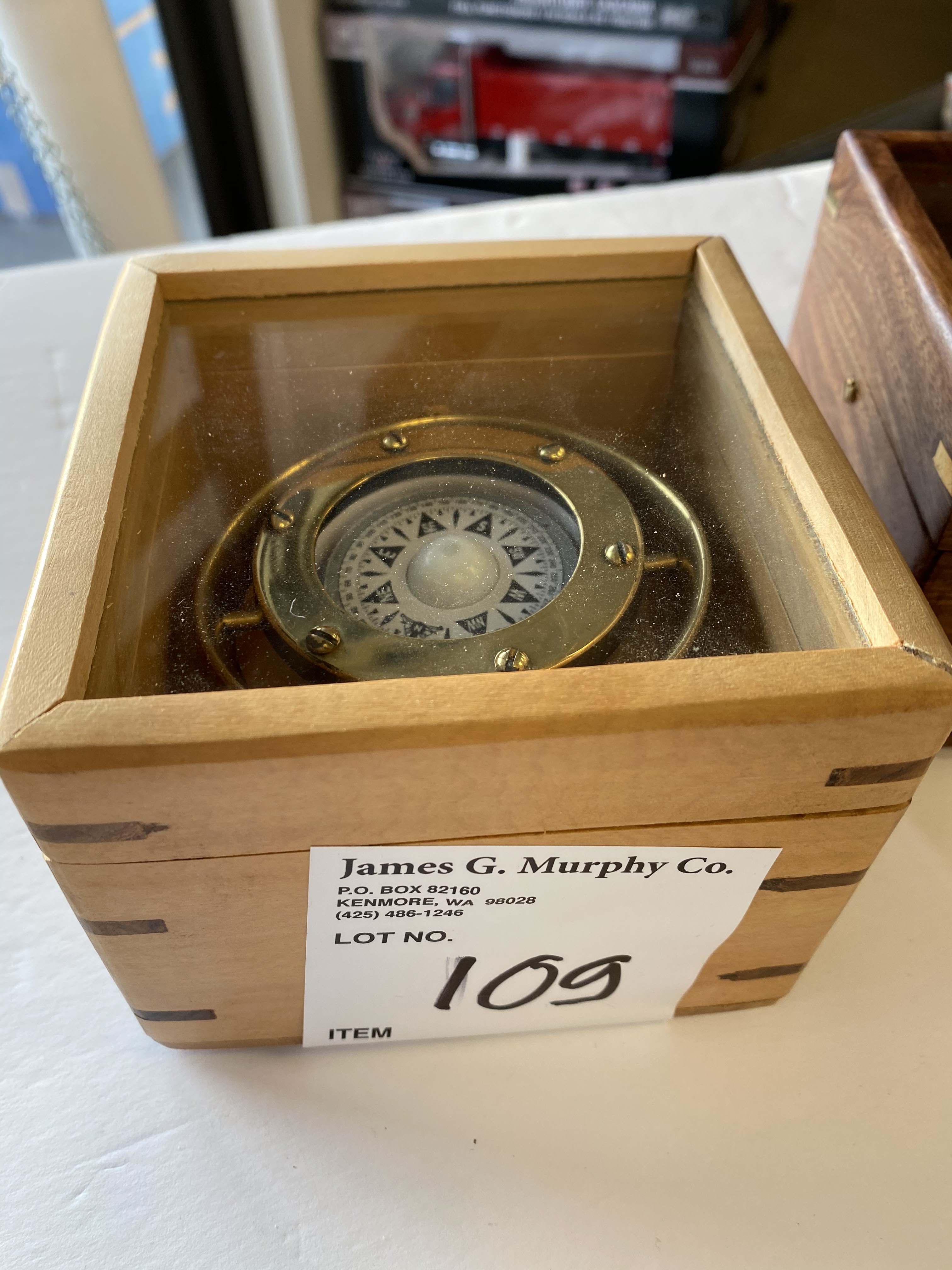 Brass compass in wooden box approx. 4.5" x 4.5" x 3.5" SAVY BOAT
