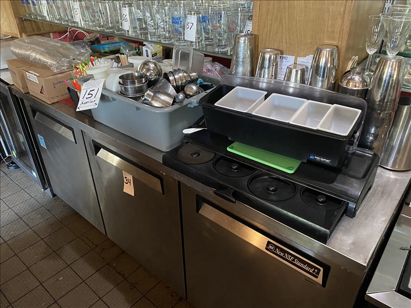 LOT, ASSORTED BARTENDER SUPPLIES ON THIS REFRIGERATOR TOP PROSPECTORS STEAK AND SPIRITS, LLC