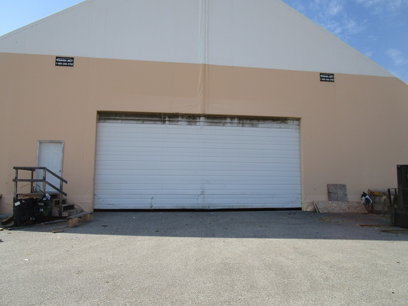 COVERALL ROCKY MOUNTAIN LOG HOMES *AUCTION POSTPONED* James G